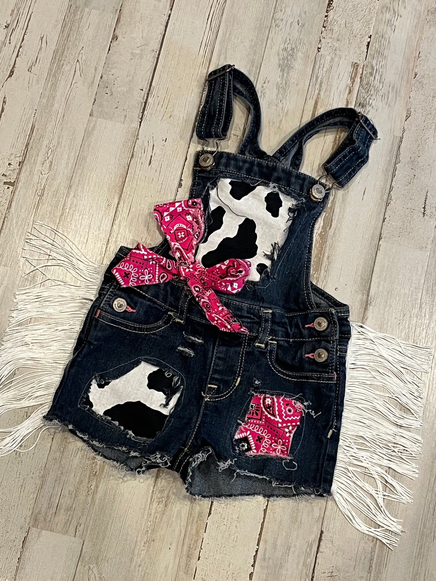 Girls Cow print shortalls w/fringe ( overalls) - cows - boutique - Patched bandana print overall shorts- distressed- cowgirl - pink bandana - farm birthday